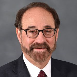 Headshot of attorney Joseph V. Kaplan, In Memoriam: Founding Principal